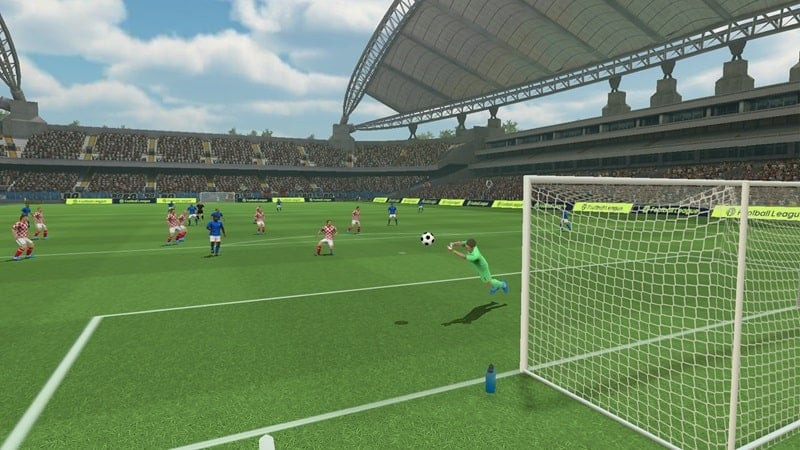alt text: Hình ảnh gameplay trận đấu trong Football League 2025 MOD APK, cho thấy cầu thủ đang ăn mừng bàn thắng.